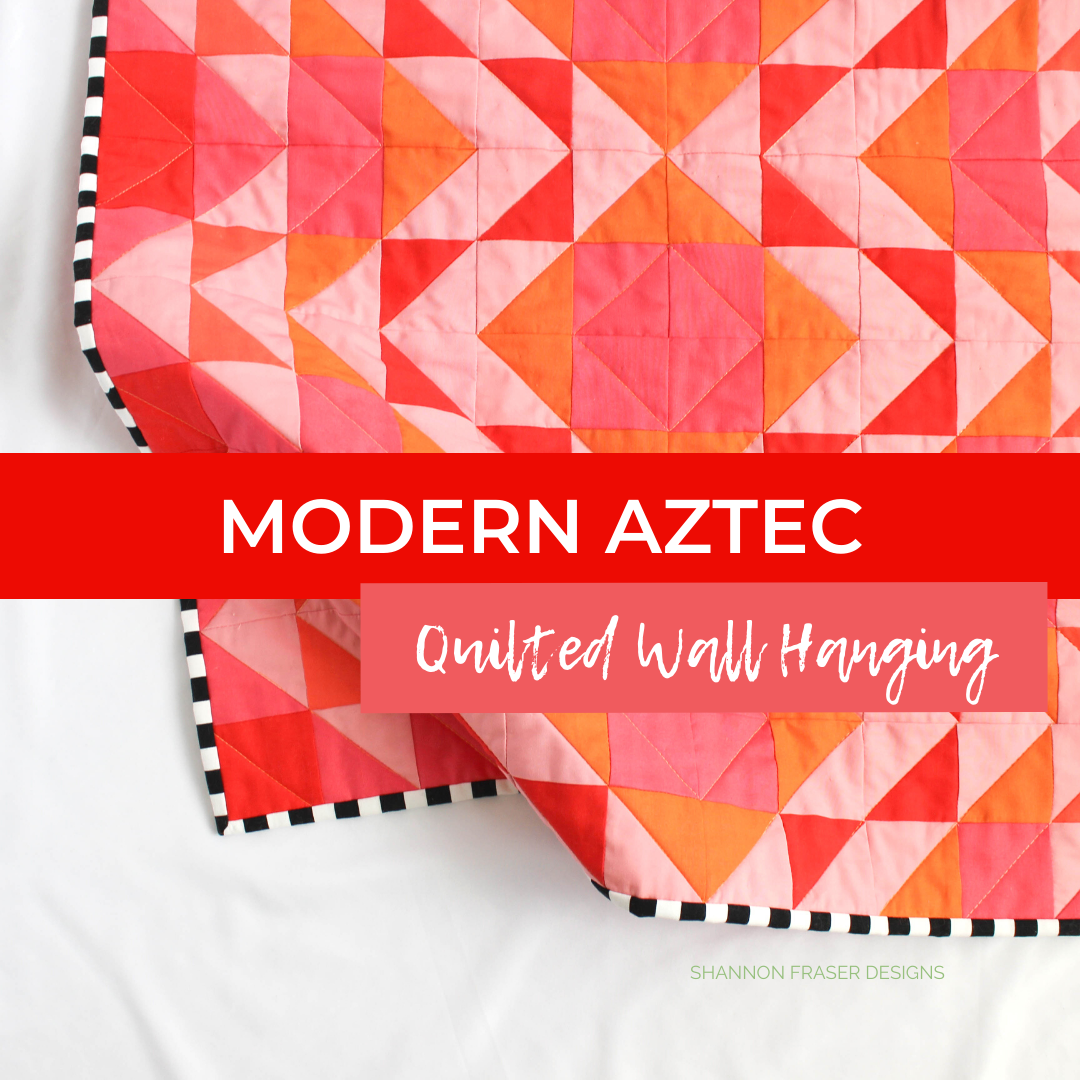Modern Aztec Mini Quilt in shades of coral