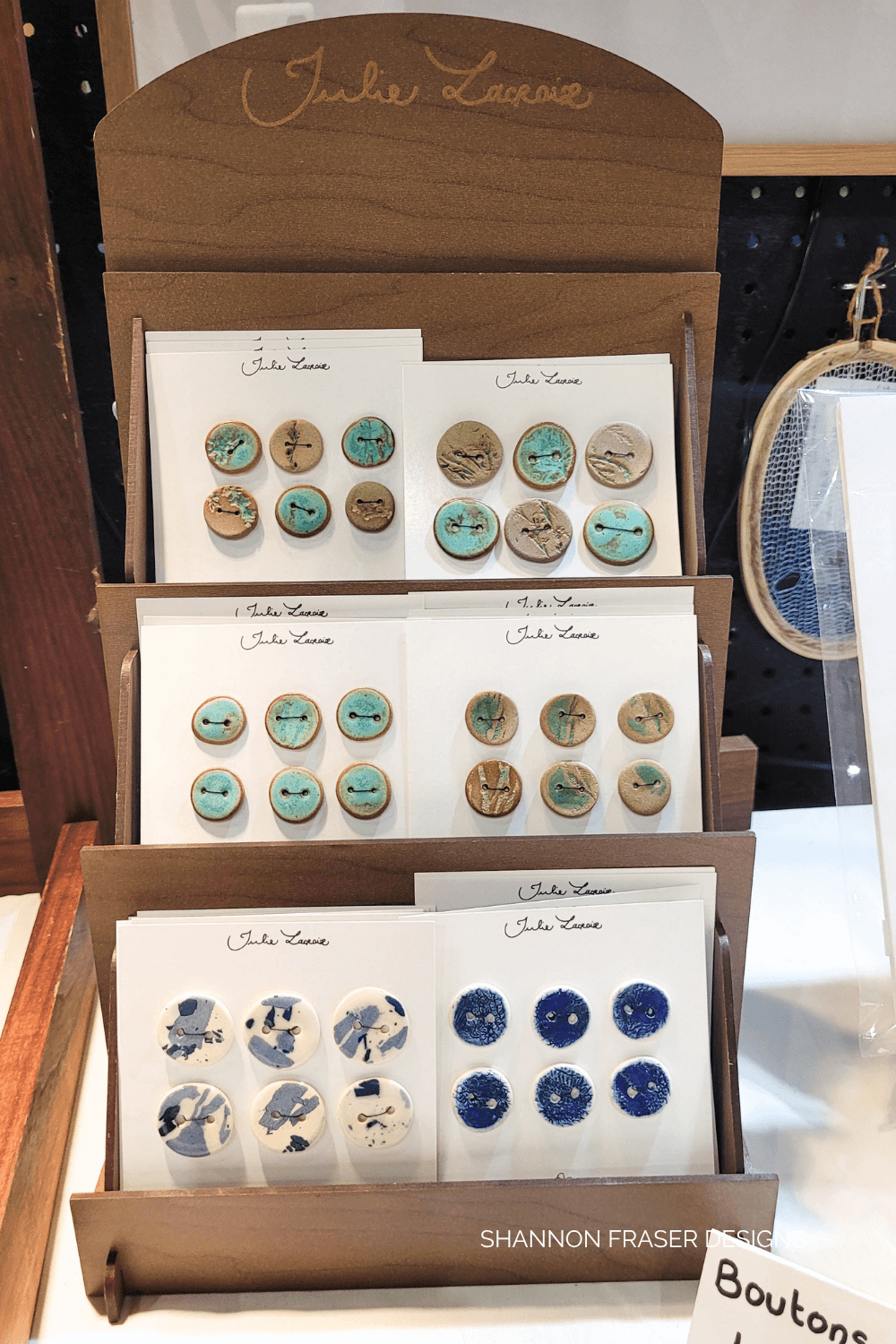 Custom art buttons I found by Julie Lacroix at Twist Fiber Festival 2025